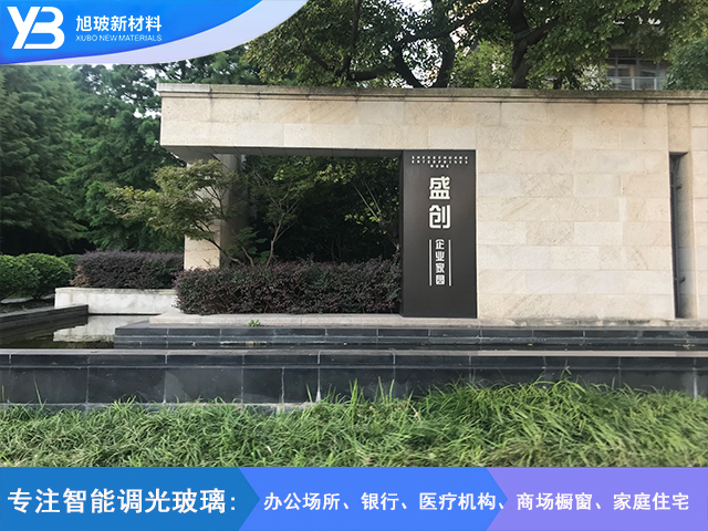 盛创企业家园弯钢加平钢地弹簧门调光玻璃